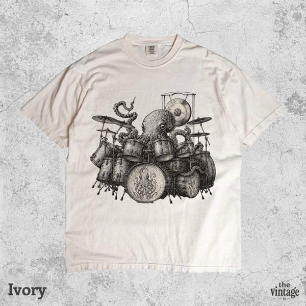 Vintage Retro Comfort Colors Octopus Playing Drums Shirt vintage graphic tee by TheVintageBy